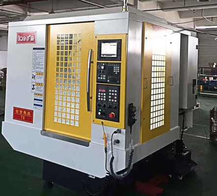 चीन 16 टी पत्रिका सीएनसी वर्टिकल ड्रिलिंग मशीन 250 केजी मैक्स लोड वर्किंग टेबल फैक्टरी